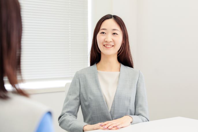 「#つながるdポイント」を中心となり推進している社員へのインタビュー風景の画像1