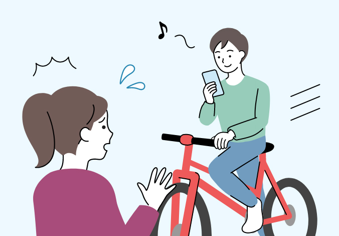 スマホで動画を観ながら自転車を運転している人のイメージ図